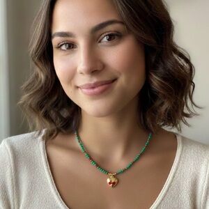 Elegant Green Beaded Necklace with Heart Pendant